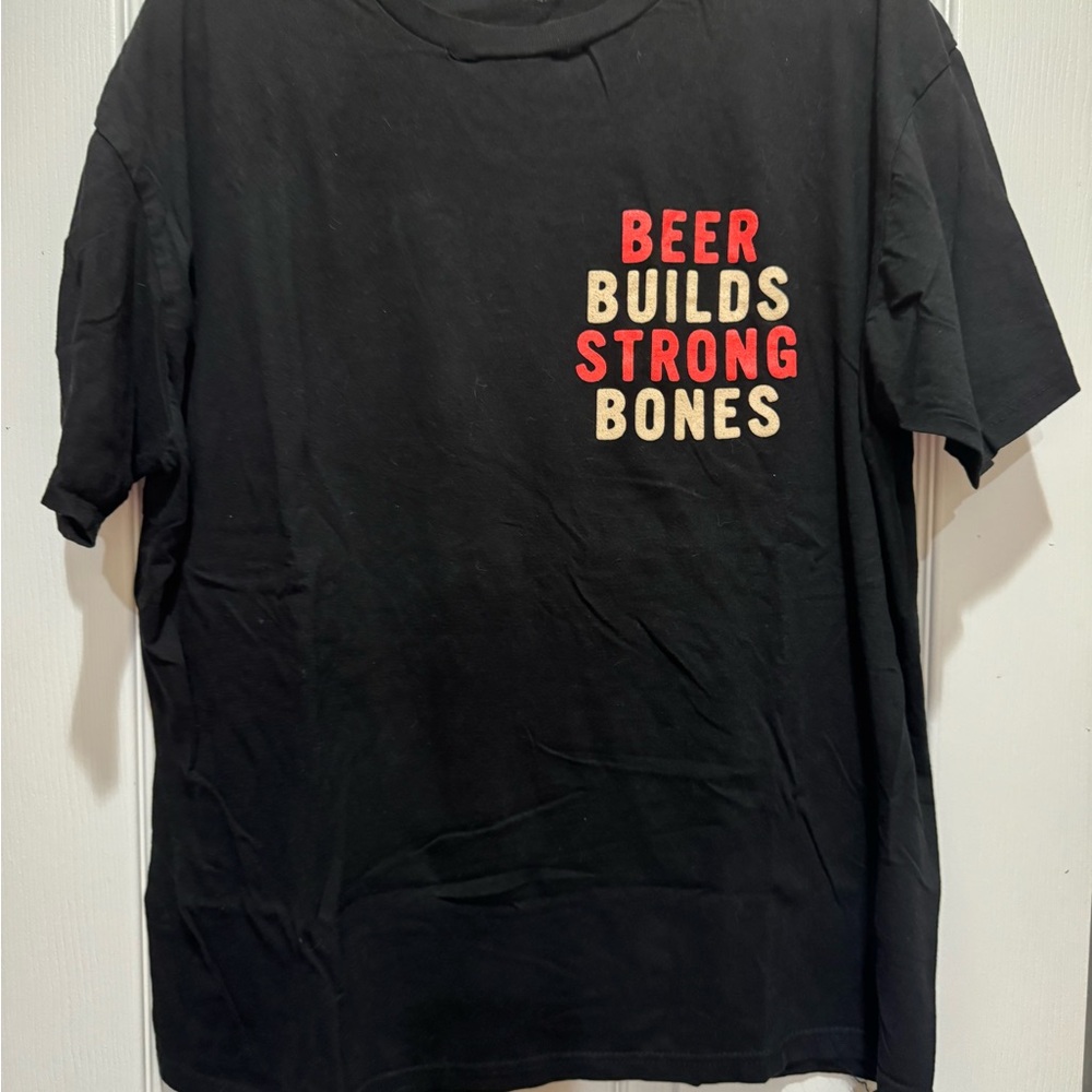 Black Graphic Tee with Bold Text Design